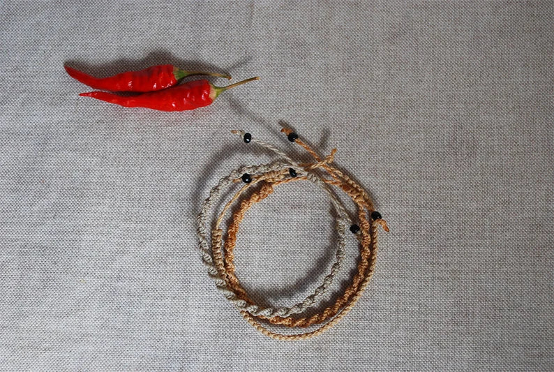 Set of three macramé bracelets, neutral colors