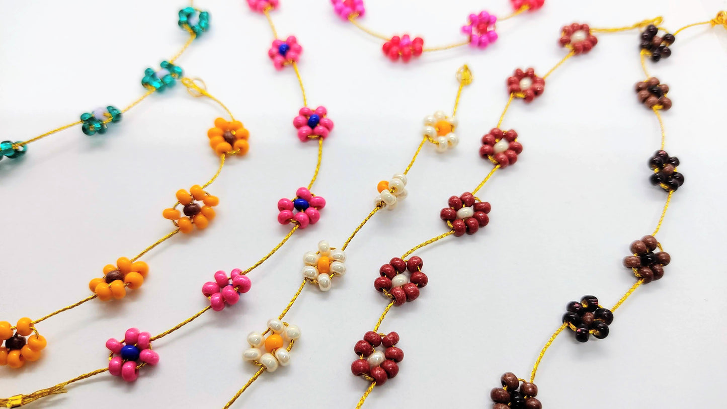 braccialetti e collane flowers tutti i colori insieme