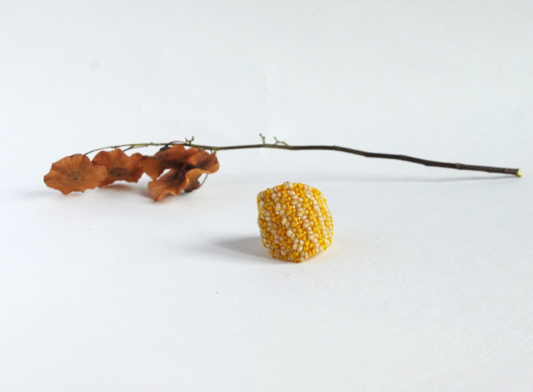 Yellow and cream band ring