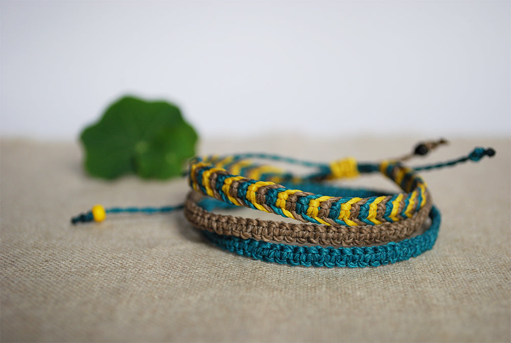 Set of three yellow and teal macramé bracelets