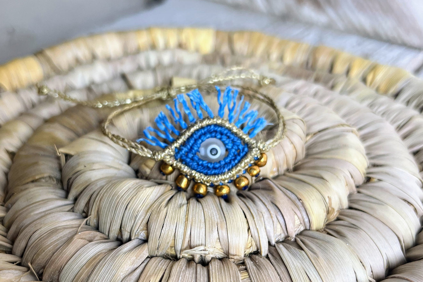 bracciale malocchio blu oro macrame evil eye