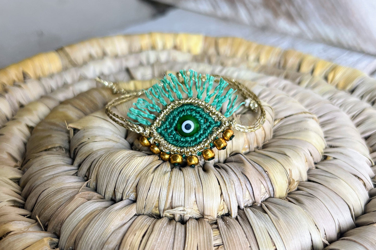 bracciale evil eye verde oro macramé