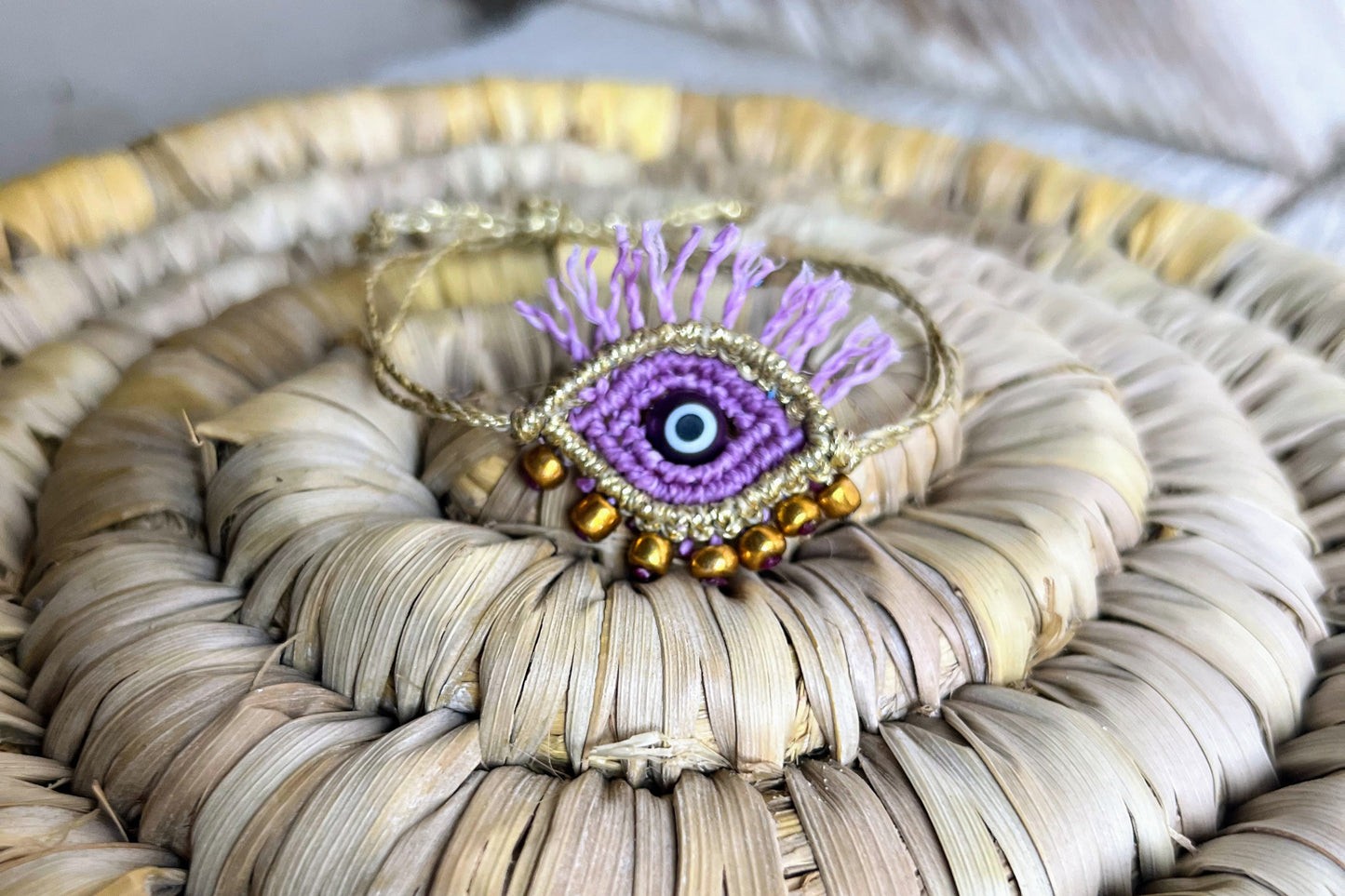 bracciale evil eye viola oro macramè