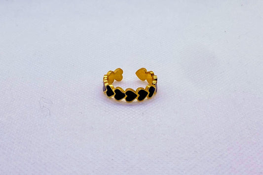 Anello oro con cuori neri