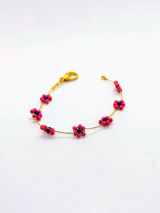 braccialetto flowers magenta blu sfondo bianco
