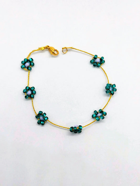 braccialetto fiori verde lilla sfondo bianco