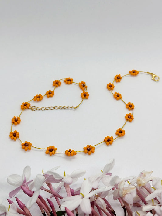 collana flowers girasoli marrone giallo sfondo bianco