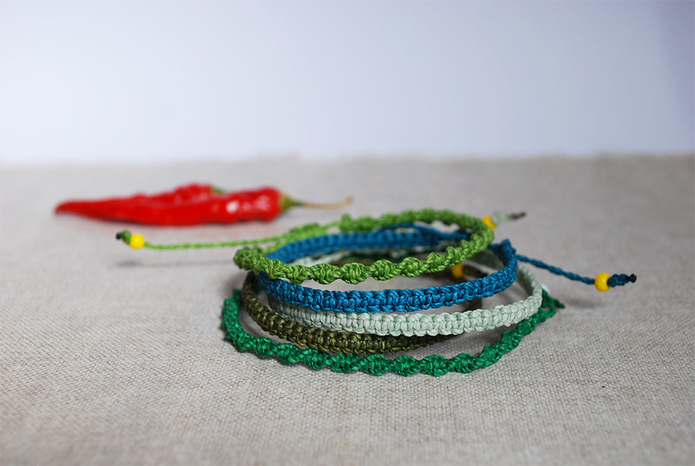 Set of five macramé bracelets in shades of green