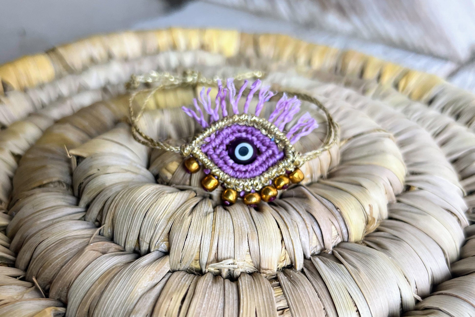 bracciale evil eye viola oro macramè