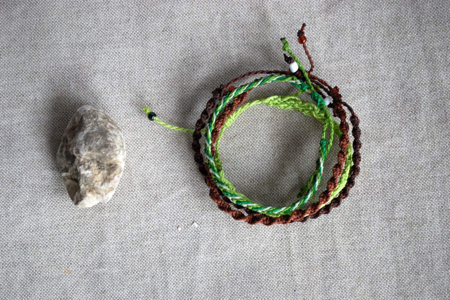 Set of four green and brown macrame bracelets